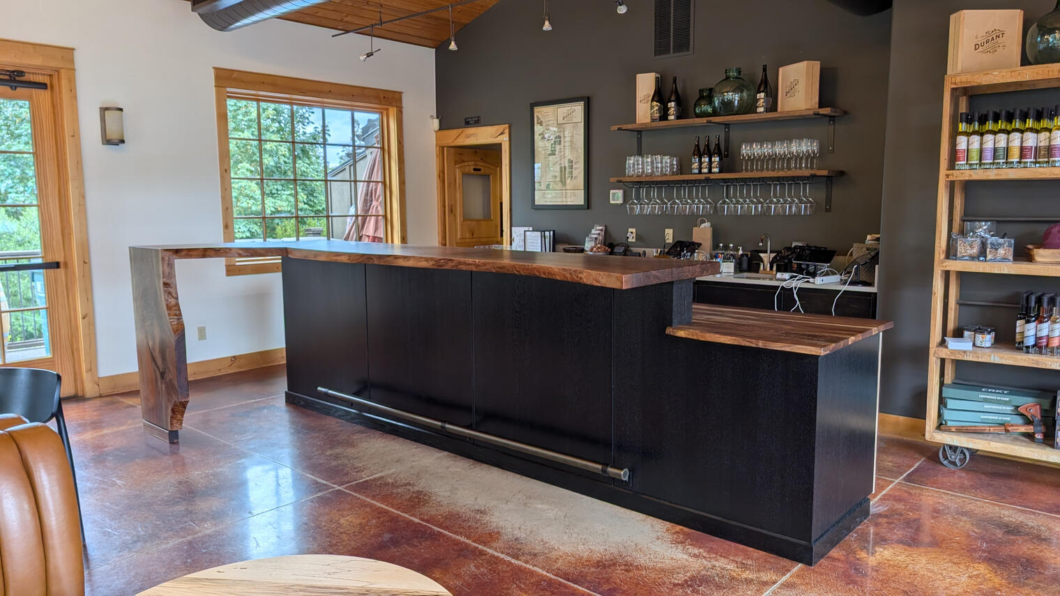 Durant Vineyard tasting room bar featuring solid walnut counters, custom maple cabinets, and blackened quartersawn oak panels