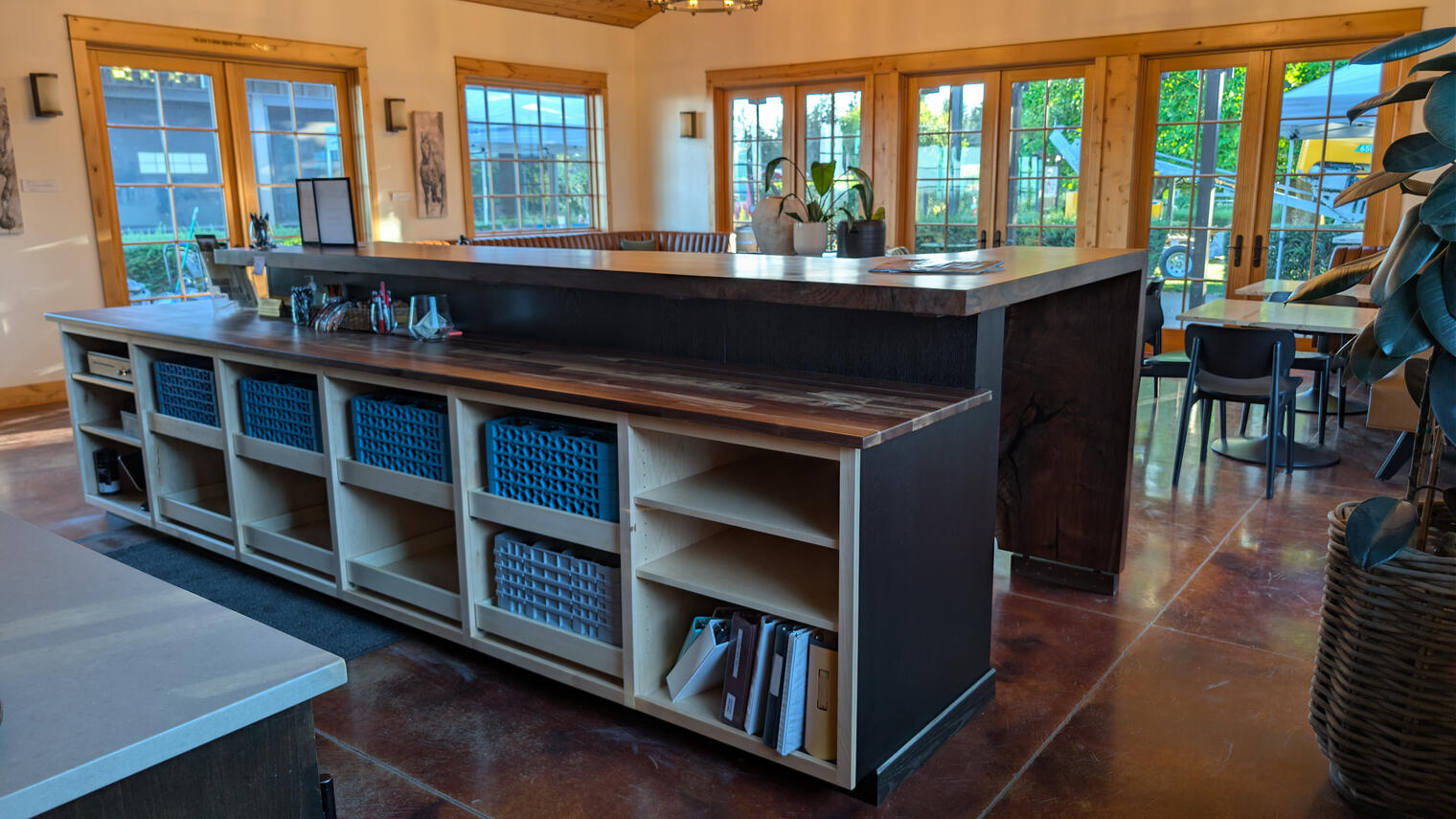 Durant Vineyard tasting room bar featuring solid walnut counters, custom maple cabinets, and blackened quartersawn oak panels